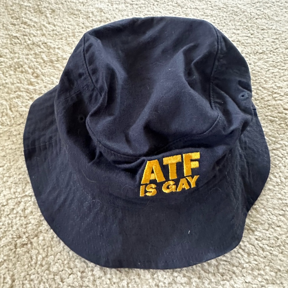 Dirty Kid ATF Is Gay bucket hat.